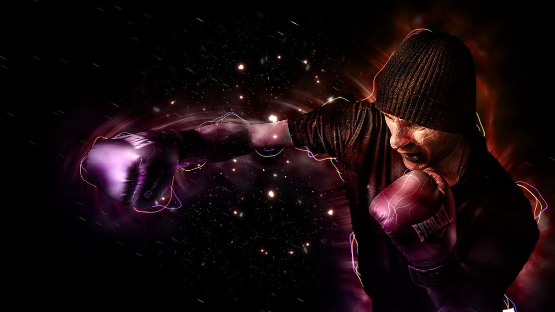 A man wearing a black t-shirt and boxing gloves is throwing a punch.