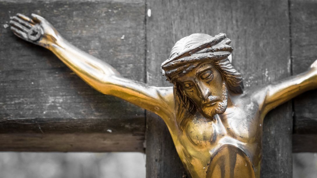 A sculpture showing the body of Jesus hanging from the cross.